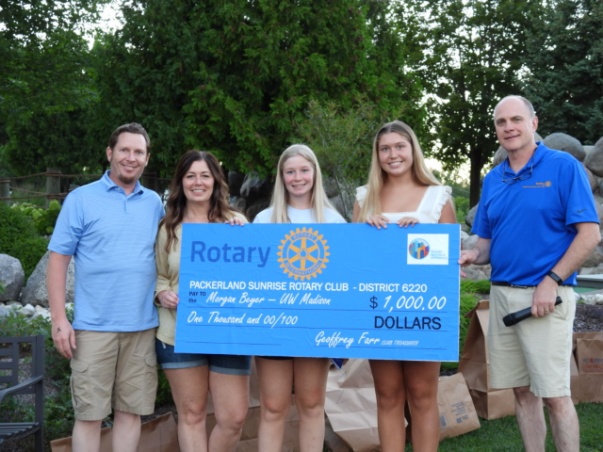 Scholarship winner with family